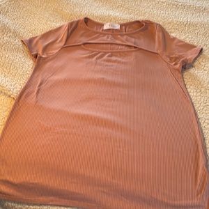 Dusty rose short sleeve top with cut out detail. Never worn